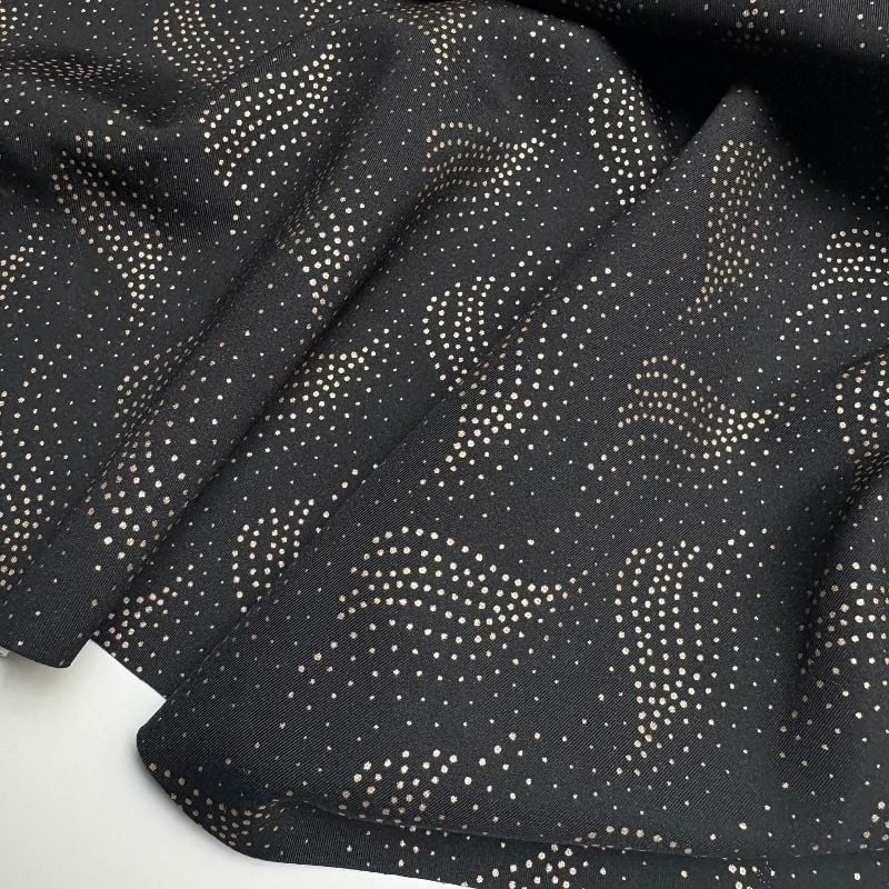 tissu technique sportswear - noir et or